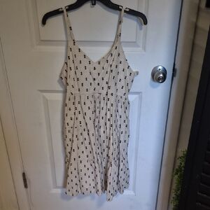 Sleeveless Cream Sundress with Black Dot Print